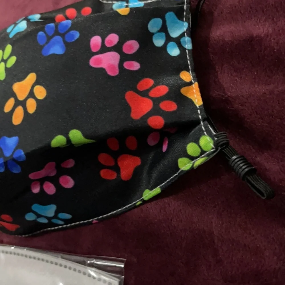 New multi color paw print face mask